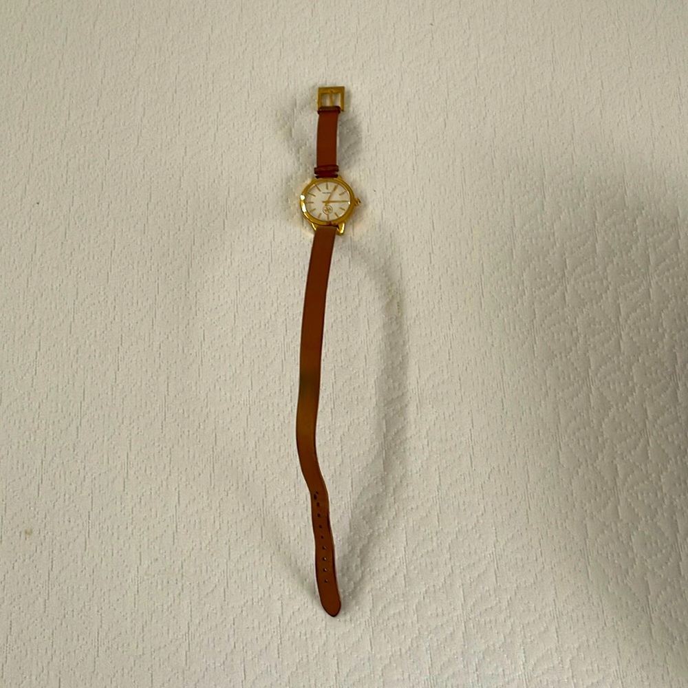 Gently used Tory Burch watch.